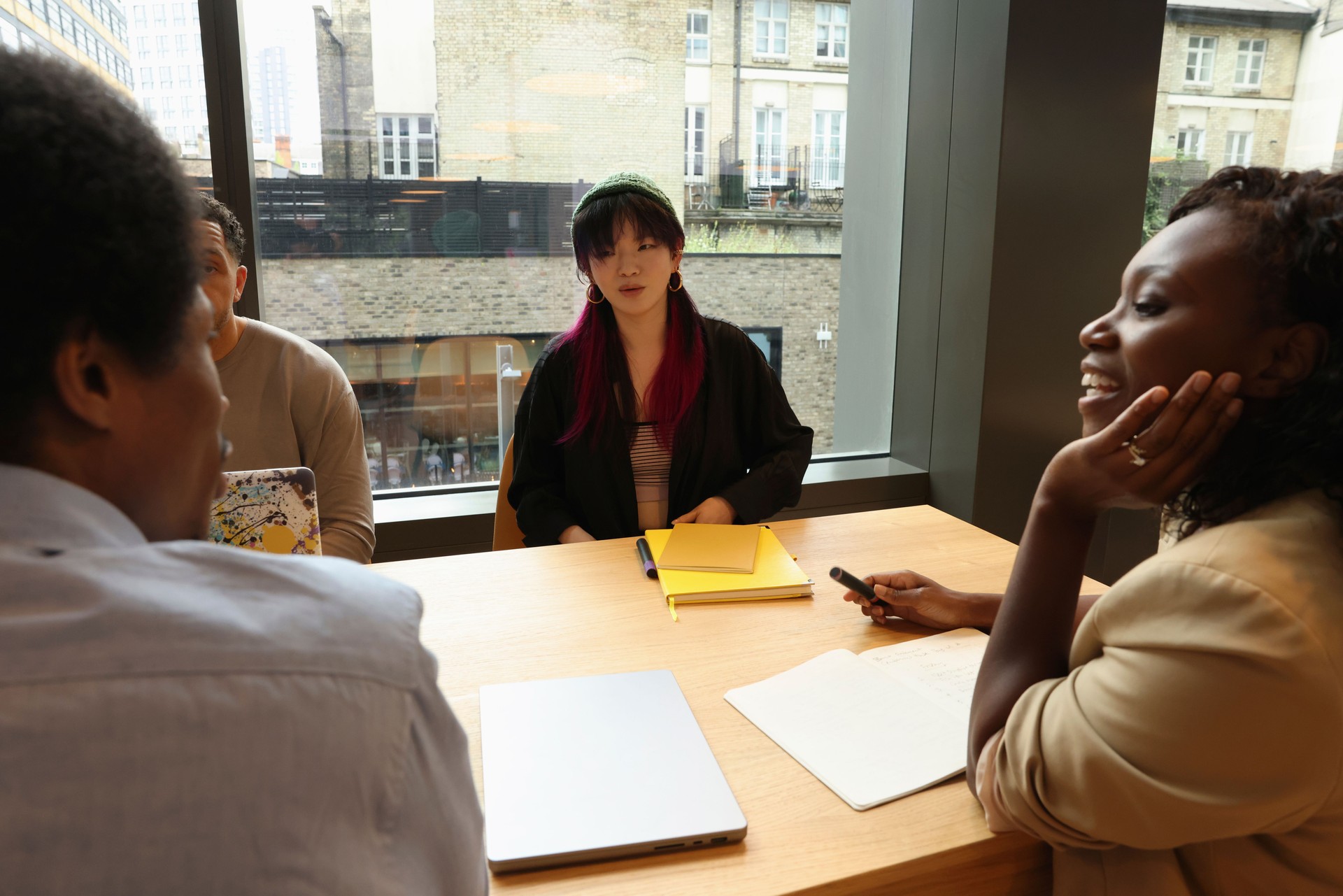 Diverse group of business people talking in office